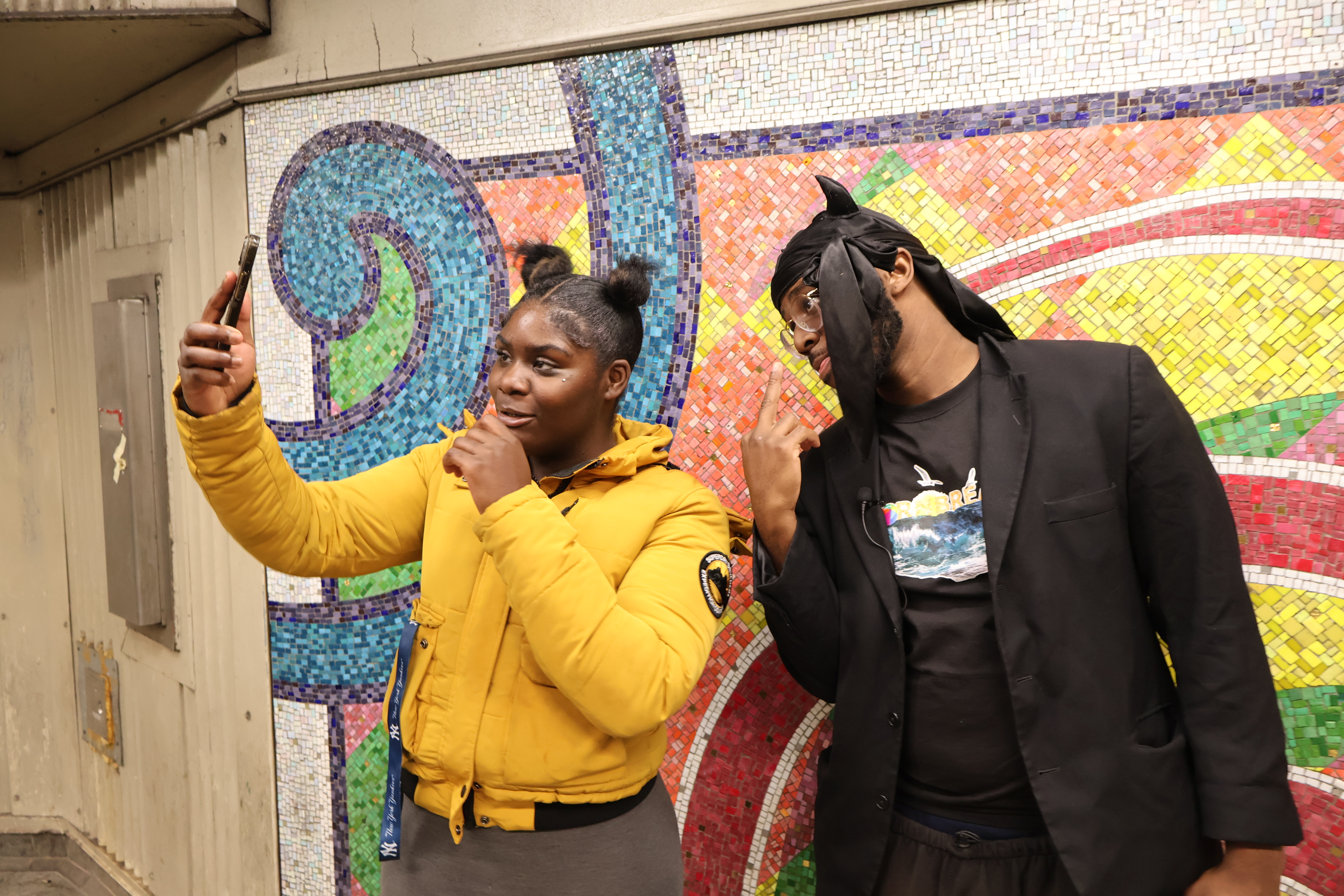 Morris Cordewel taking pictures with fans.