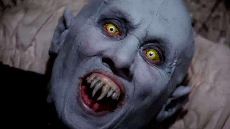 Kurt Barlow waking up and showing his fangs in Salem's Lot