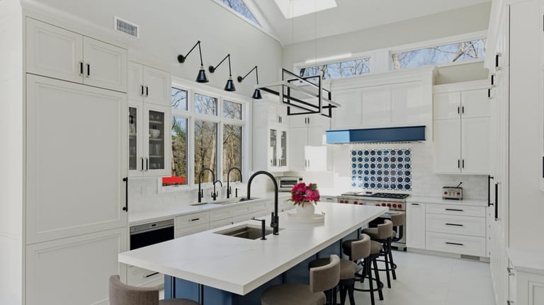 The kitchen was revamped by designer Ken Kelly, whose work...